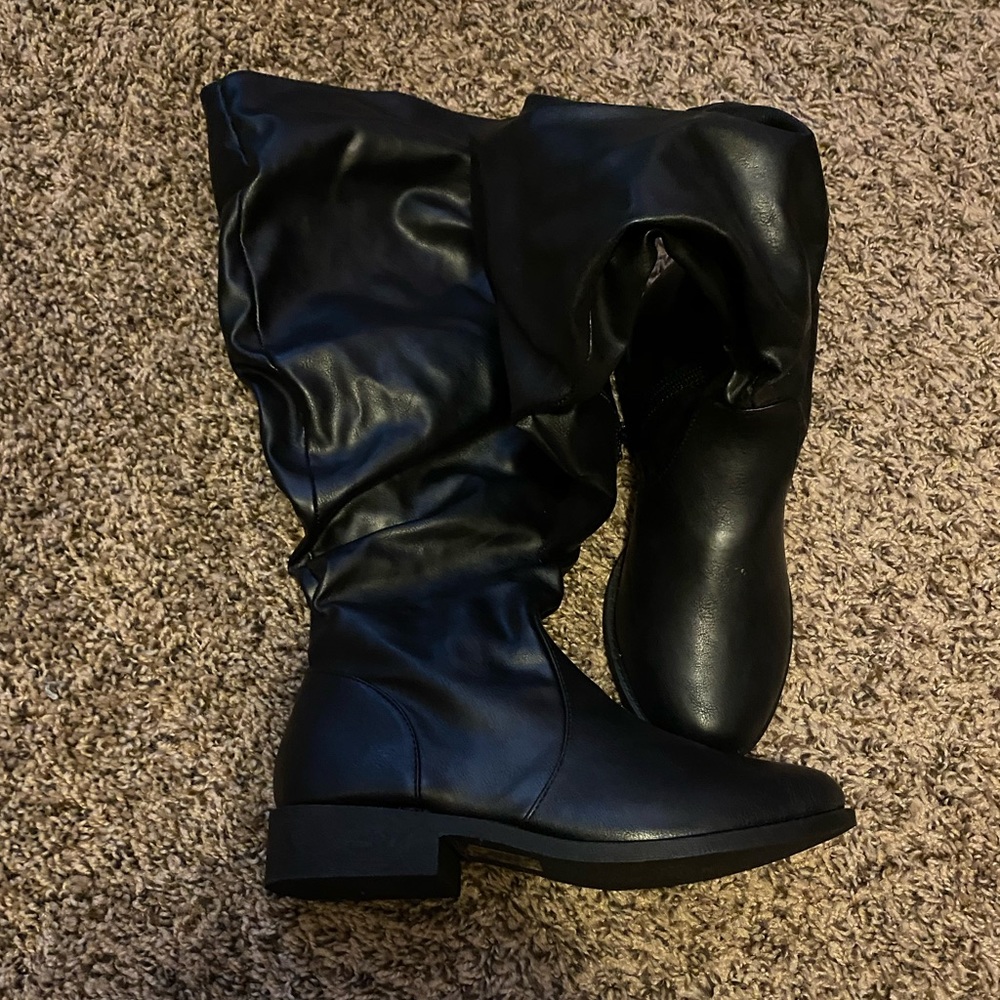 Black to the knee boots
